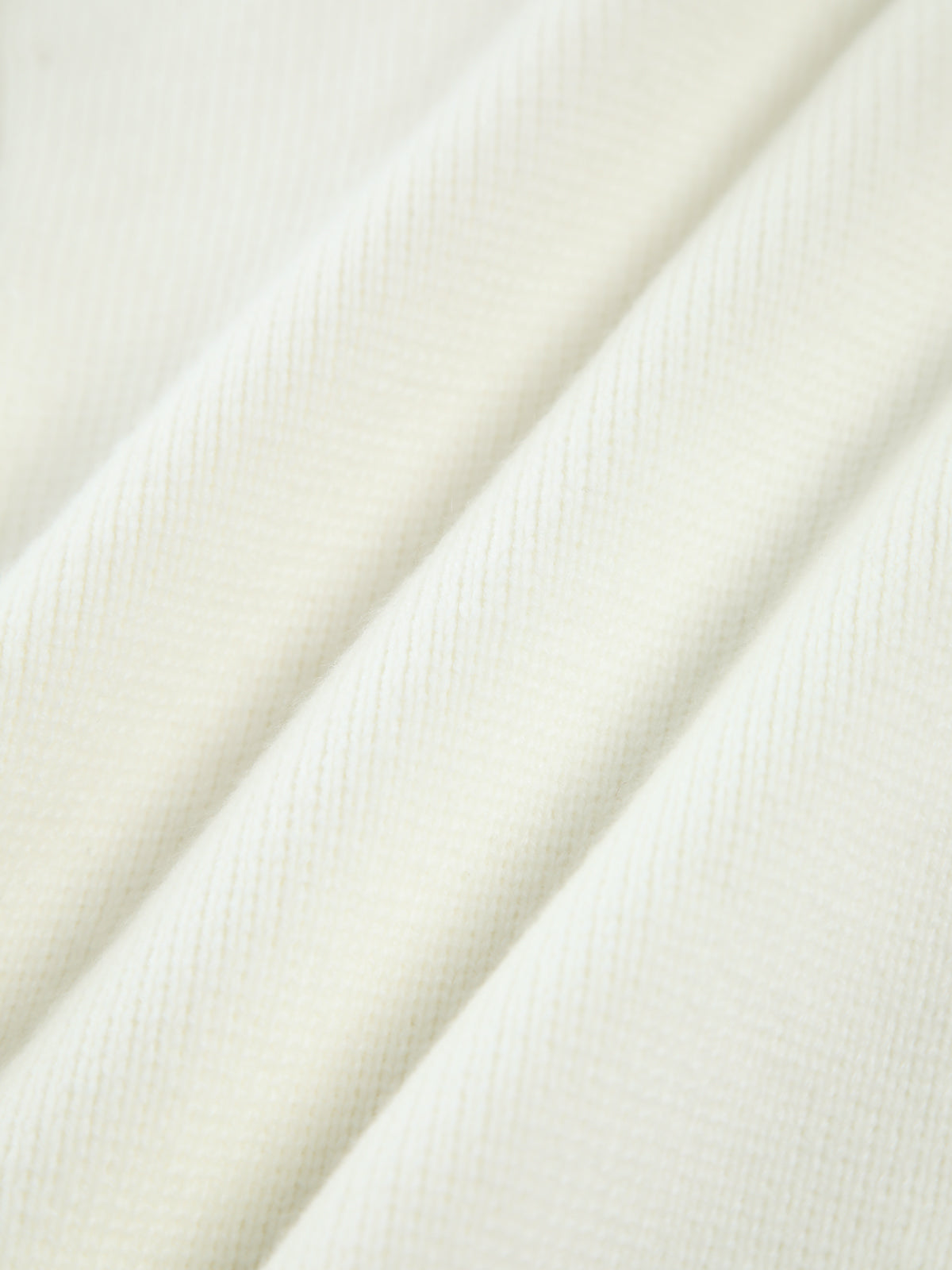 Blanca • Chaqueta De Punto Con Perlas Y Bajo Deshilachado