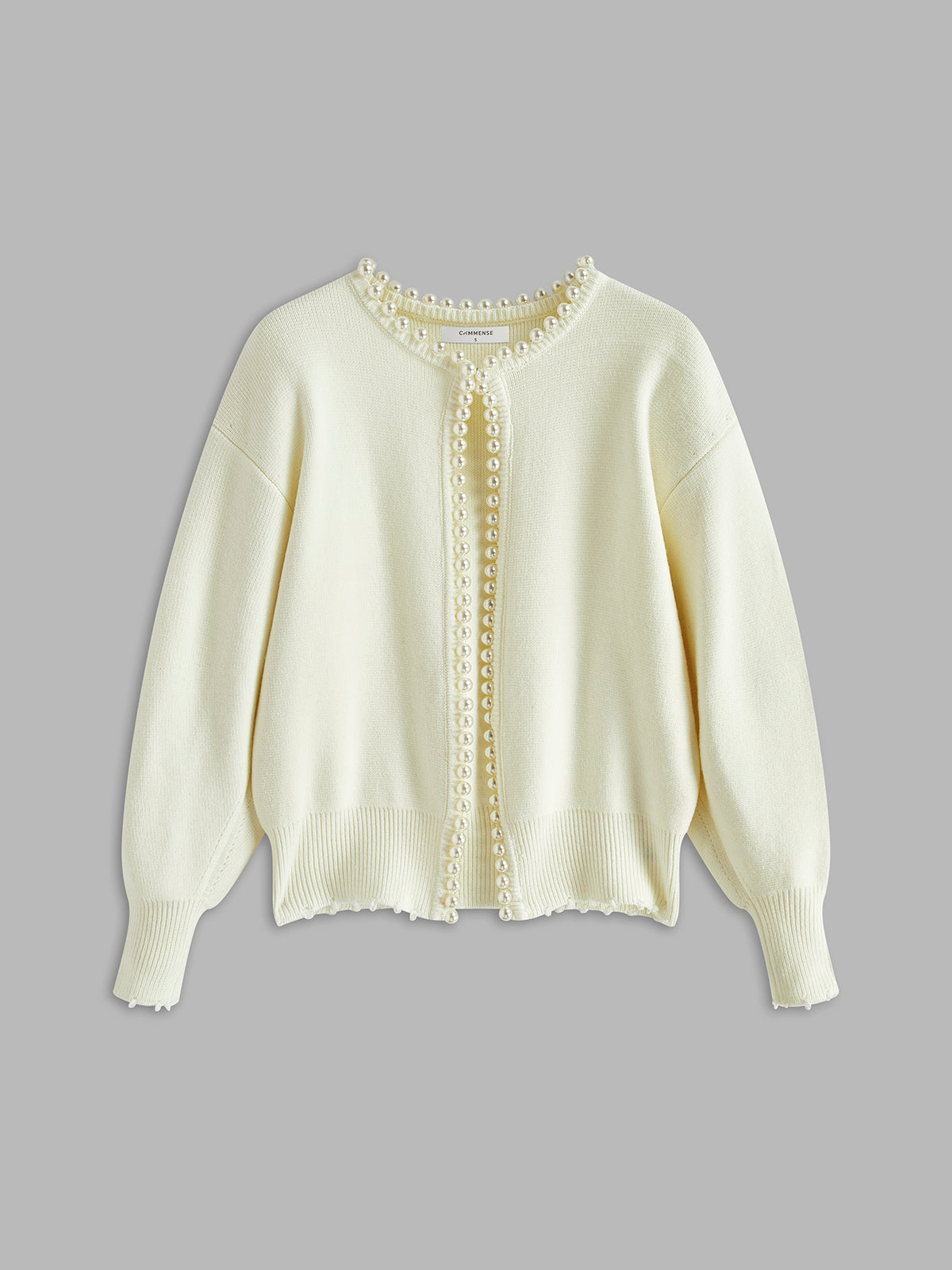 Blanca • Chaqueta De Punto Con Perlas Y Bajo Deshilachado
