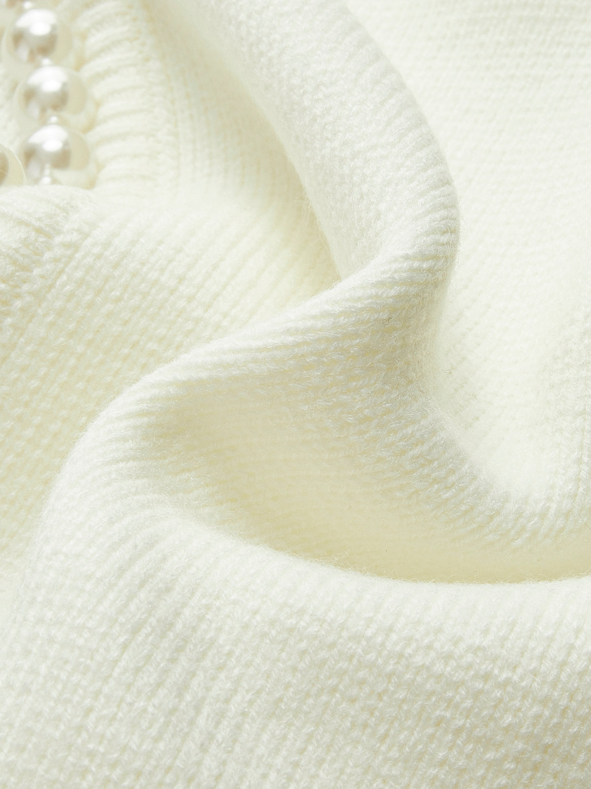 Blanca • Chaqueta De Punto Con Perlas Y Bajo Deshilachado
